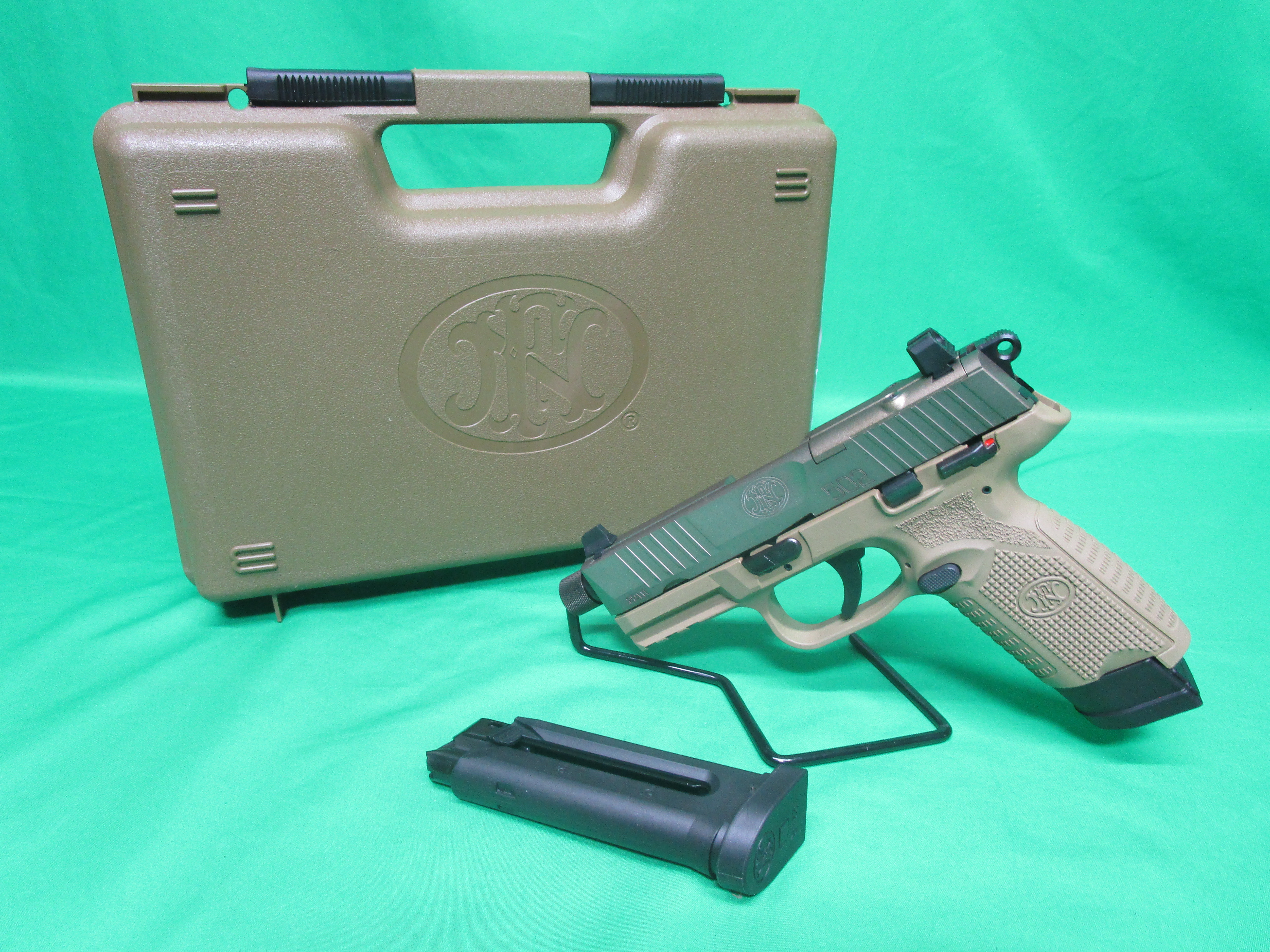 USED FN 502 TACTICAL 22LR 4.5" W/ CASE & 2 MAGS LR050297