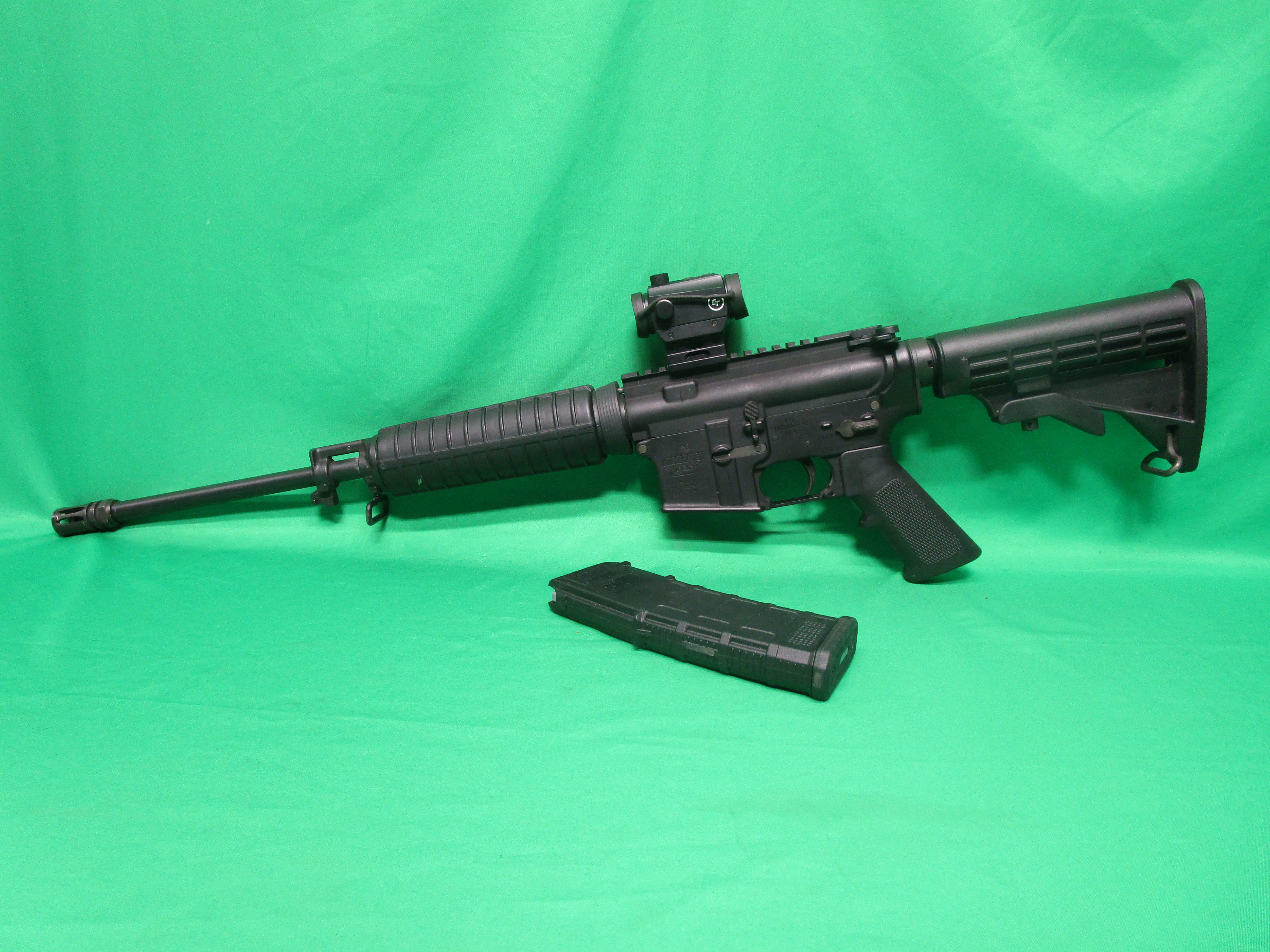 USED BUSHMASTER XM15-E2S 5.56NATO 16" W/ RED DOT & 1 MAG BK5096230
