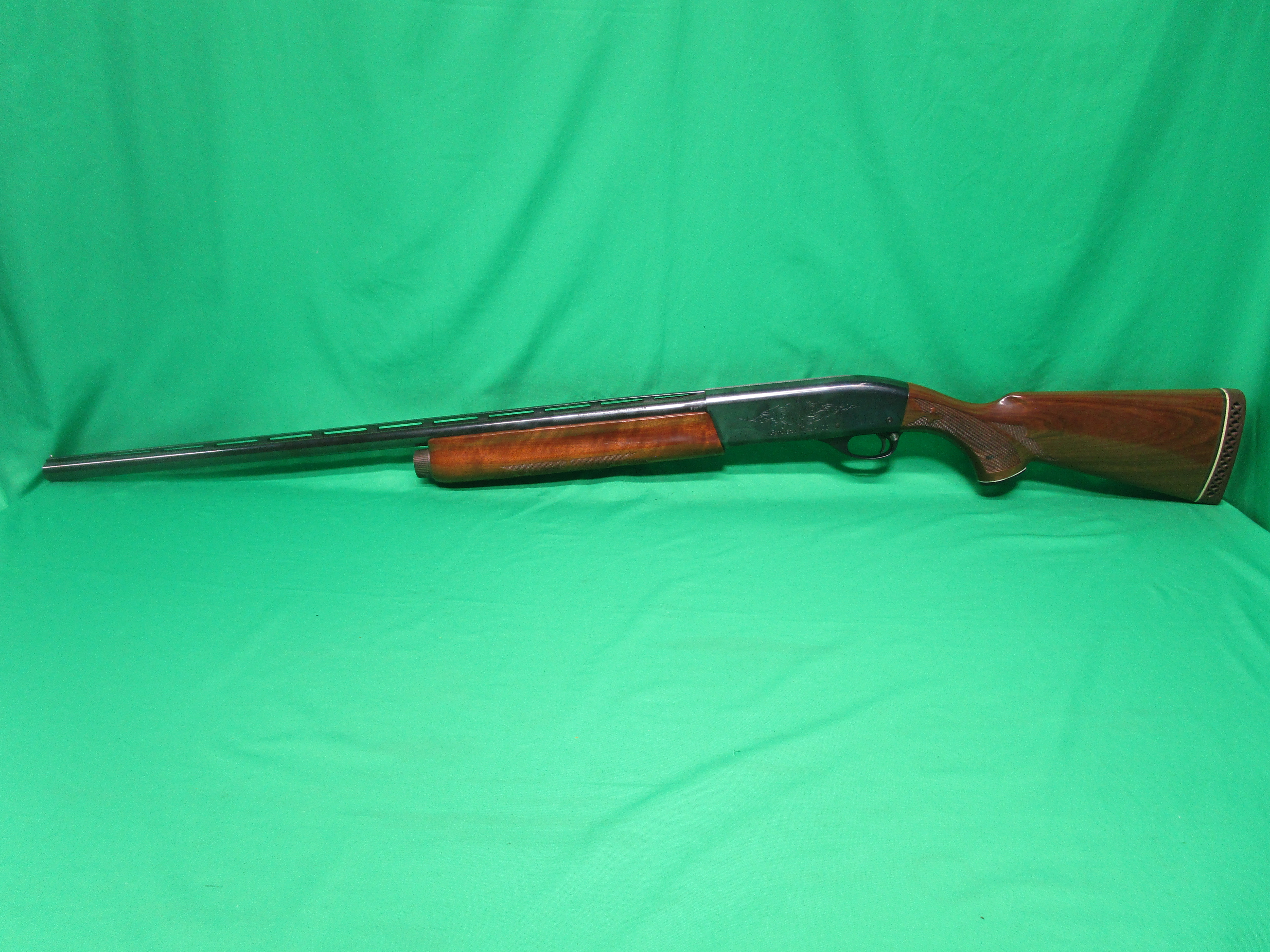USED REMINGTON 1100 12GA 28" MODIFIED VENT RIB M066118V